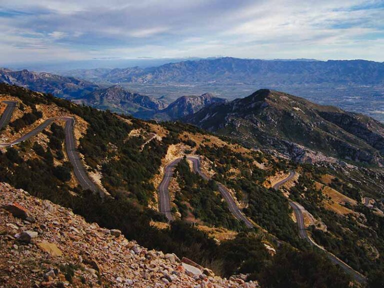 Scenic Drives from Benifallet: Exploring Catalonia's Ebro Valley & Beyond Photo of a winding road up Mount Caro in Els Ports National park